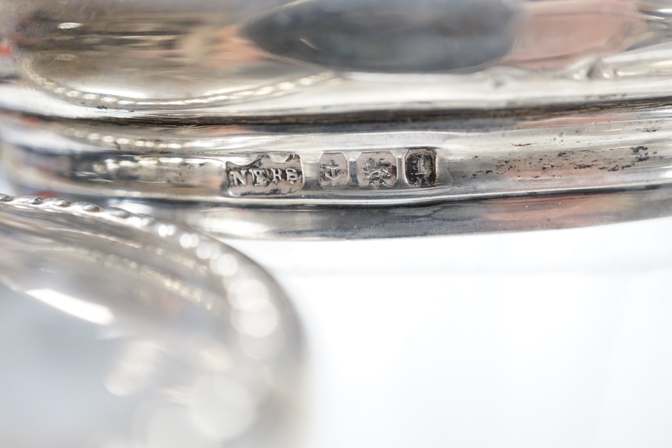Forty four assorted silver or white metal mounted glass toilet bottles, tallest 18cm, a quantity of similar toilet jar lids and three base metal mounted glass toilet jars.